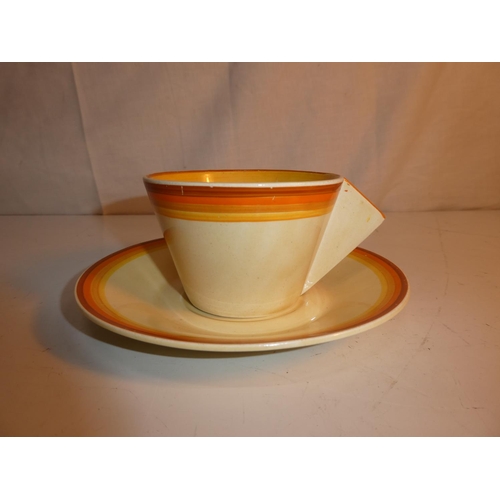 97 - A stunning Art Deco Clarice Cliff cup and saucer.