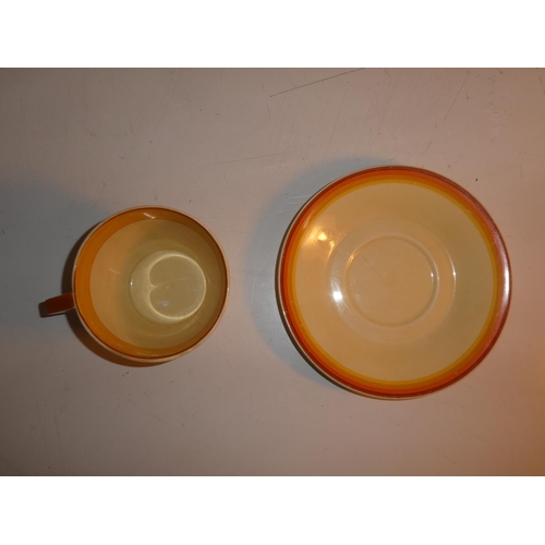 97 - A stunning Art Deco Clarice Cliff cup and saucer.