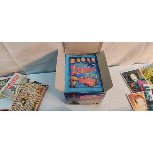 82 - A collection of vintage Bubblegum collectors cards to include Civil War, Batman, Flags of the World,... 