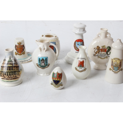 222 - A large lot of assorted Goss China including an early Belleek 'Enniskillen' barrel, townlands of Dun... 