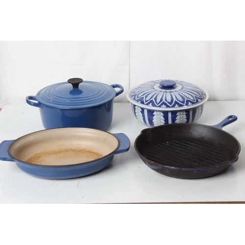 223 - Three pieces of Le Creuset kitchen ware and a blue and white ceramic lidded pot.