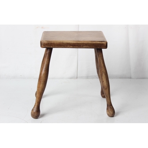 254 - A small handmade milking stool.