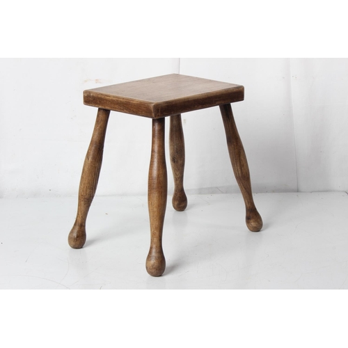 254 - A small handmade milking stool.