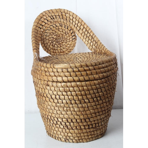 279 - A vintage rattan linen basket/ chair.