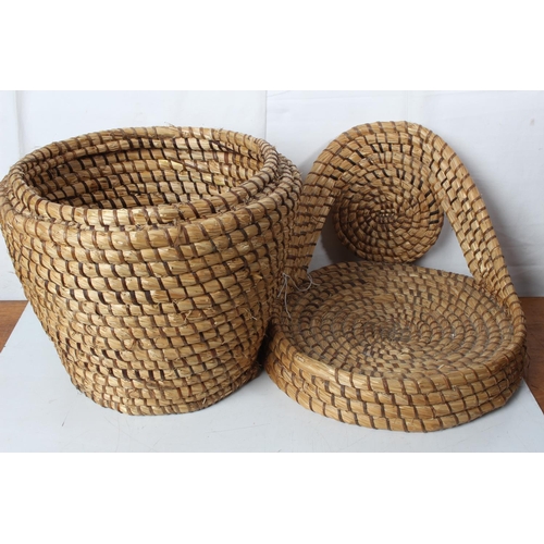 279 - A vintage rattan linen basket/ chair.