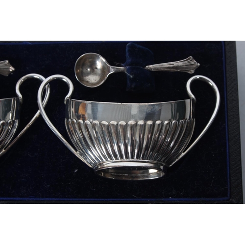 288 - A cased pair of antique Sterling Silver salt pots and spoons, Sheffield 1898.