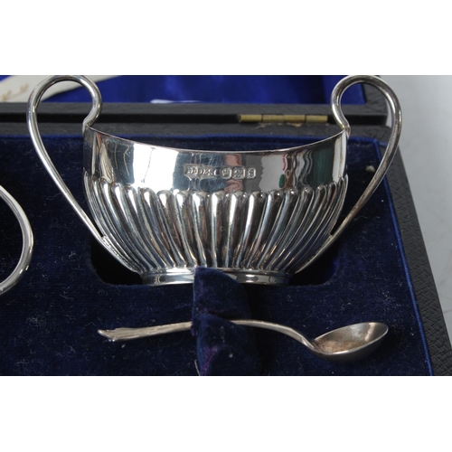 288 - A cased pair of antique Sterling Silver salt pots and spoons, Sheffield 1898.