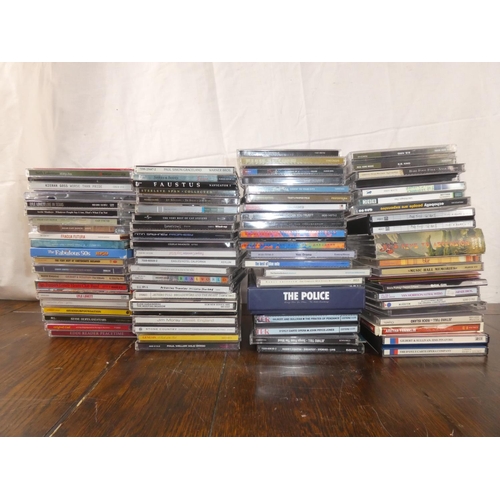 111 - A large lot of musical cd's to include Van Morrison, Jethro Tull, Cash and lots more.