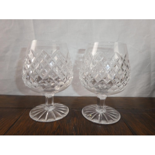 117 - Two cased Tyrone crystal Sperrin Tulip brandy glasses.