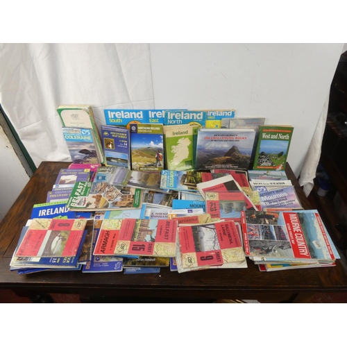 138 - A large lot of assorted maps, travel leaflets, books and more.