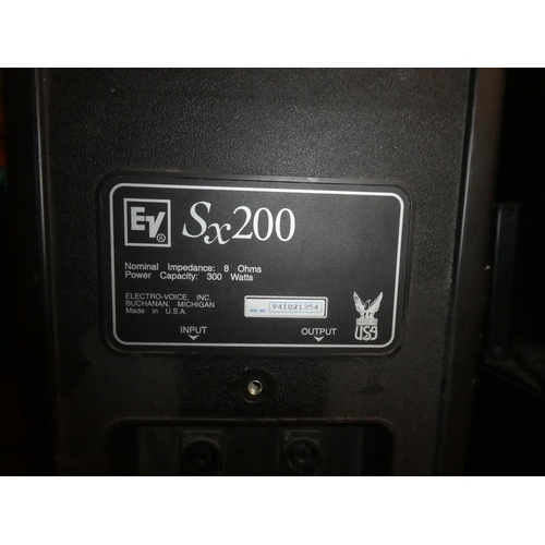 168 - A pair of large Electro Voice Sx200 300 watt speakers, measuring 57cm x 42cm x 31cm.