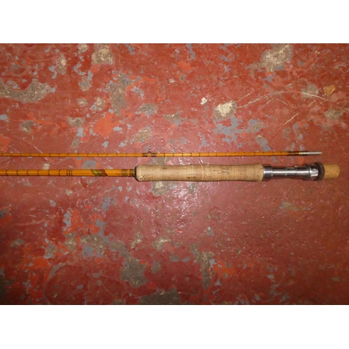 179 - A vintage Alcocks 'Aristocrat' spilt cane fishing rod.