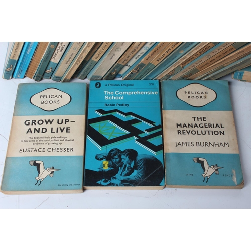 35 - A collection of vintage Pelican Books.