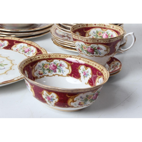 52 - A large Royal Albert 'Lady Hamilton' tea set, including cake plate, dish and more.