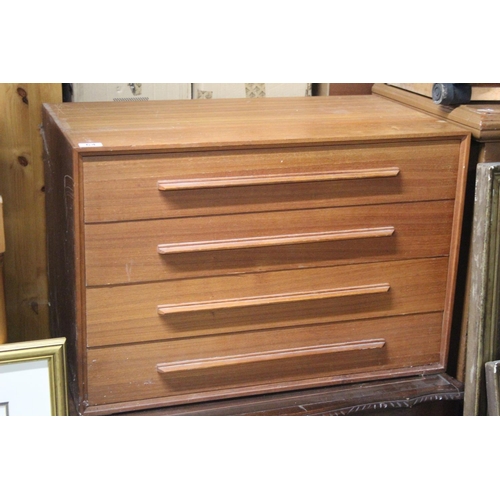 64 - A vintage mid century chest of four drawers. 76x51x43cm.