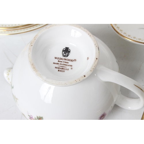 71 - A Wedgwood 'Mirabelle' bone china tea set including teapot, cake plate and lots more.