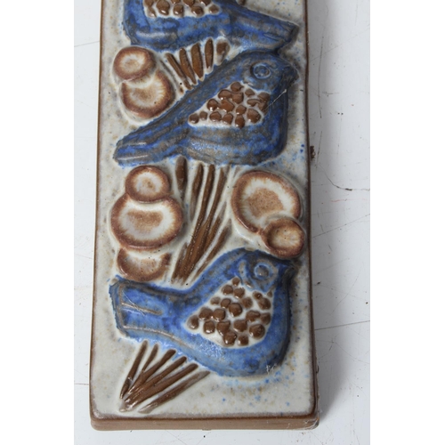 73 - A Marianne Stark pottery wall plaque of birds. 33x8cm.