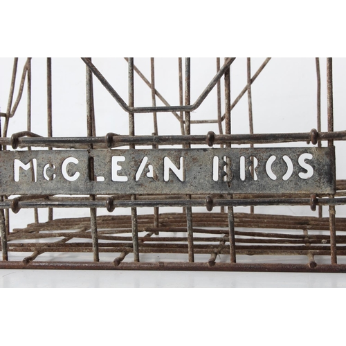 77 - A vintage McClean Brothers metal bottle crate.