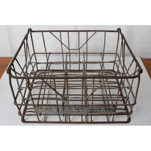 77 - A vintage McClean Brothers metal bottle crate.