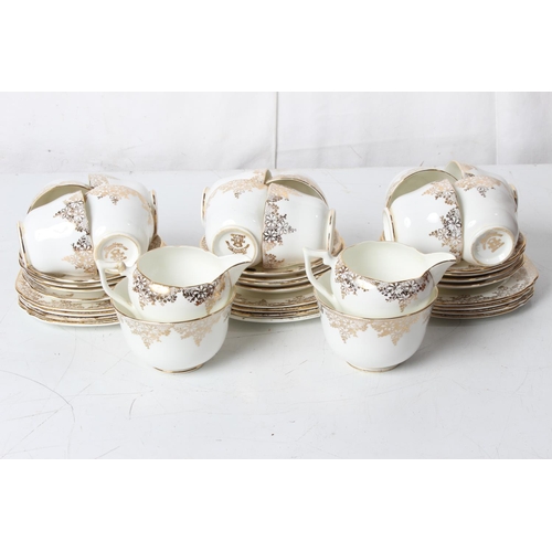 95 - A vintage Royal Crown 'Trentham' bone china tea set with gilt floral detail.