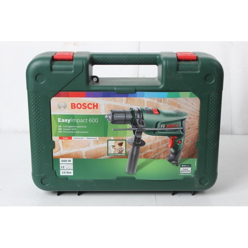 370 - A cased Bosch Easy Impact 600 electric drill.