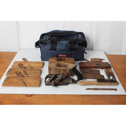 373 - A Ryobi power tool bag and a lot of wood planes and more.