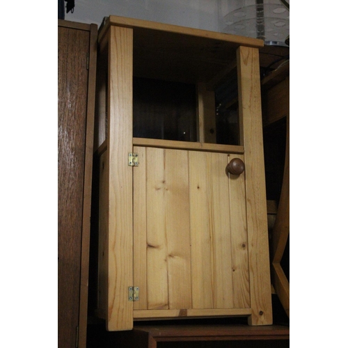 377 - A pine bedside locker.