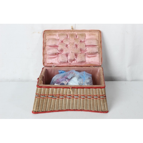 389 - A vintage sewing basket and contents.