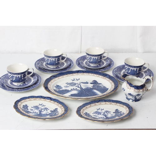 393 - A mixed lot of antique 'Old Willow' blue and white china.