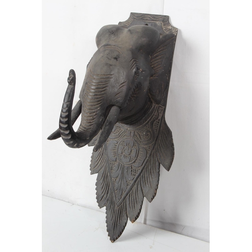 397 - A large vintage wooden elephant head wall plaque, measuring 19