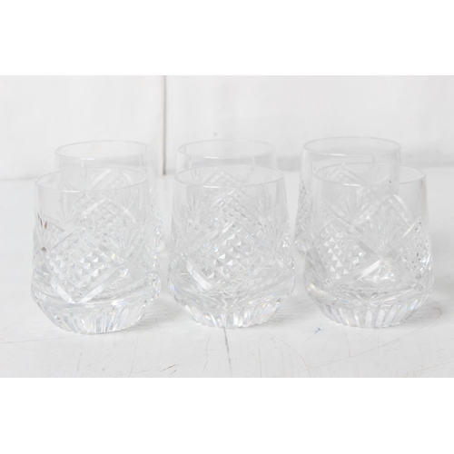 400 - A stunning set of six Tyrone Crystal roly poly whisky glasses.