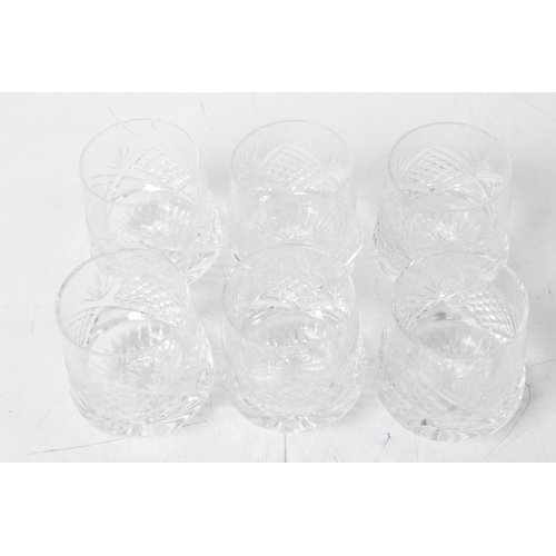 400 - A stunning set of six Tyrone Crystal roly poly whisky glasses.