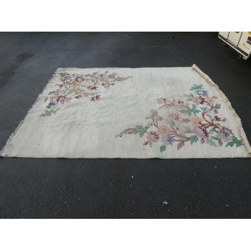 362 - A large floral patterned floor rug, measuring 147 inch x 112 inch.