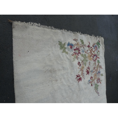 362 - A large floral patterned floor rug, measuring 147 inch x 112 inch.