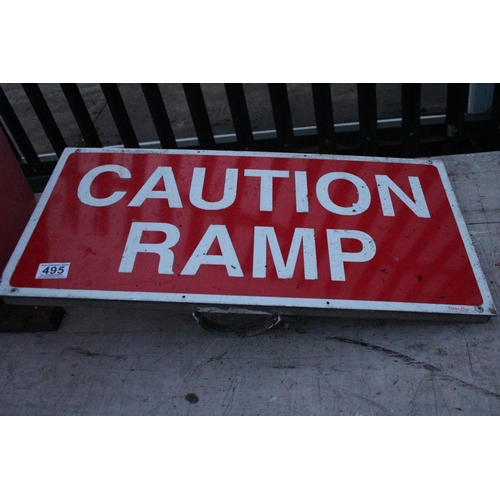 495 - A 'Caution Ramp' road sign.