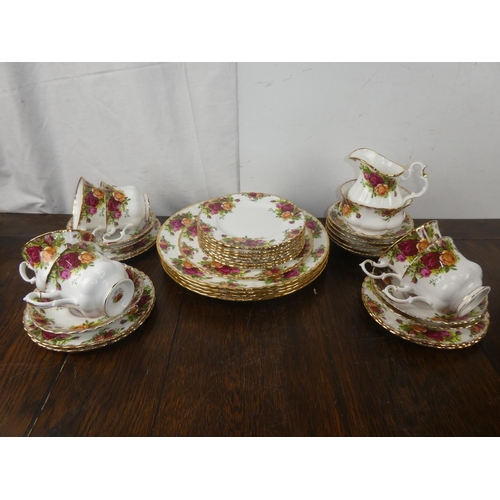 401 - A large lot of Royal Albert Old Country Rose ware including four dinner plates, milk jug and sugar b... 