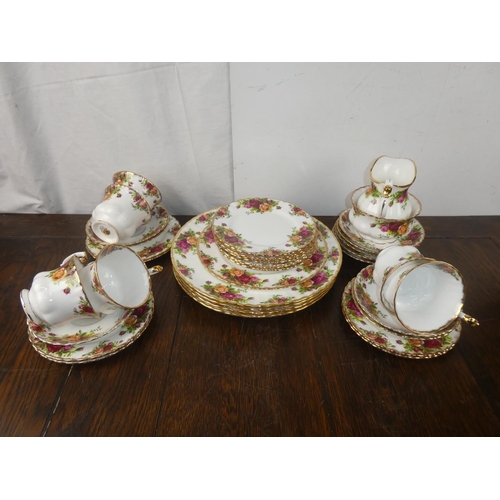 401 - A large lot of Royal Albert Old Country Rose ware including four dinner plates, milk jug and sugar b... 