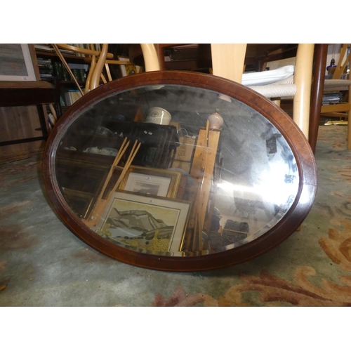 406 - A mahogany and inlay mirror.