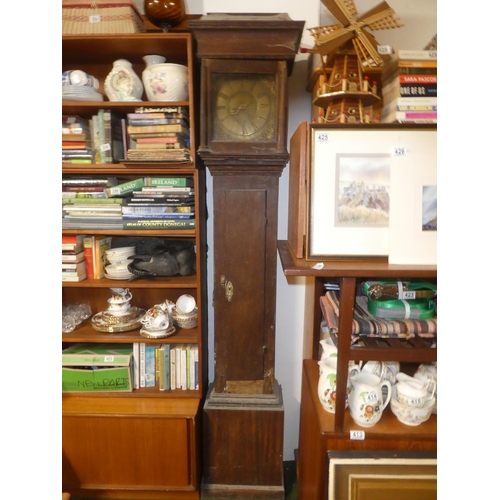 407 - An antique mahogany longcase clock with brass dial for restoration made by John Dixon Warwick.