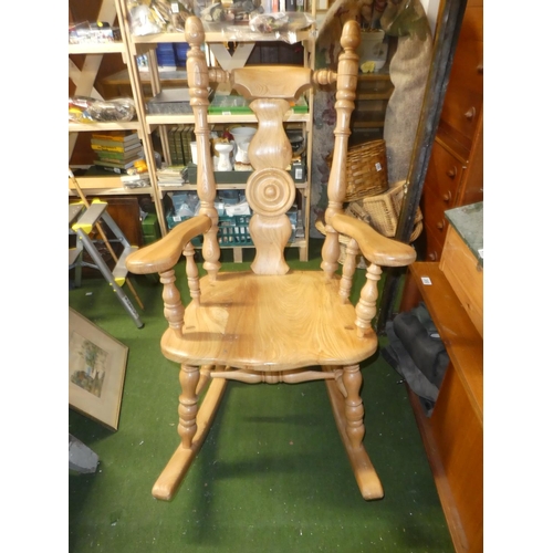 408 - A stunning pine rocking chair.