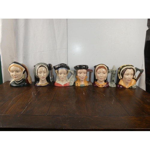 345 - A collection of Royal Doulton character jugs, depicting Henry the VIII's wives.