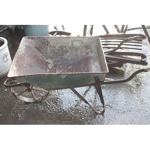 465 - A metal wheelbarrow with cast iron wheel.