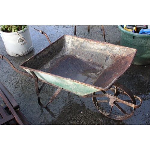 465 - A metal wheelbarrow with cast iron wheel.