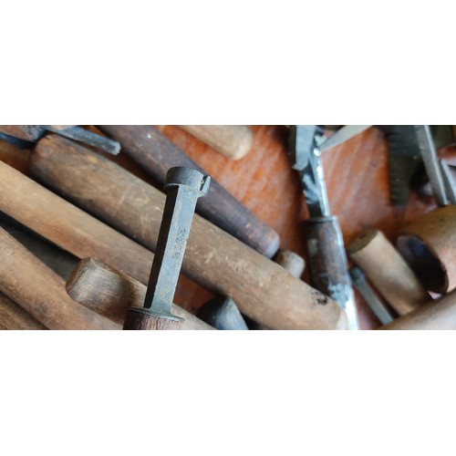 219 - A large collection of antique book binding / leather working tools.