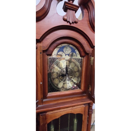 101 - A modern grandfather clock with brass dial.