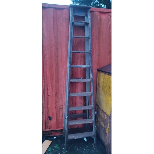 475 - A large wooden step-ladder.