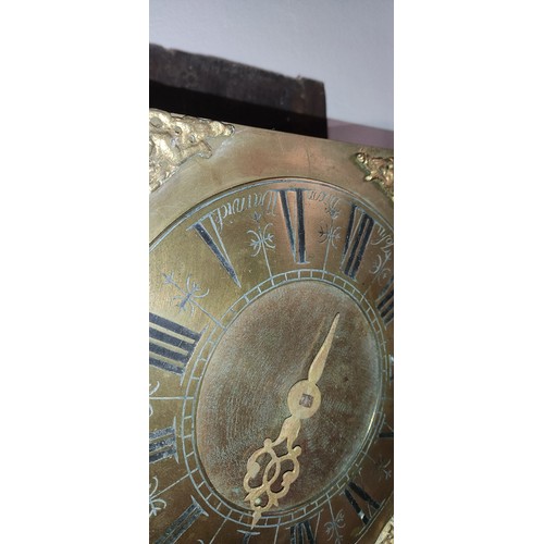 407 - An antique mahogany longcase clock with brass dial for restoration made by John Dixon Warwick.