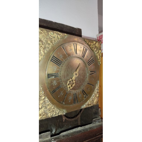 407 - An antique mahogany longcase clock with brass dial for restoration made by John Dixon Warwick.