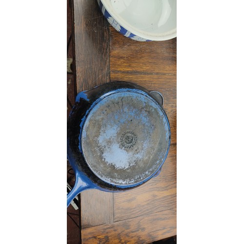 223 - Three pieces of Le Creuset kitchen ware and a blue and white ceramic lidded pot.