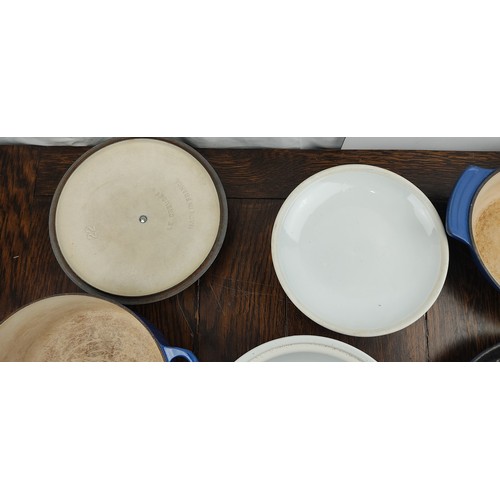 223 - Three pieces of Le Creuset kitchen ware and a blue and white ceramic lidded pot.